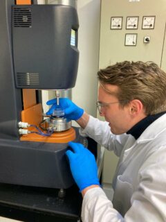 Oskar Neumann performing rheometer experiments.