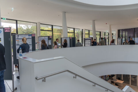 Engaging discussions during the poster session at the EBM Symposium 2025. (Image: S. Viezens)