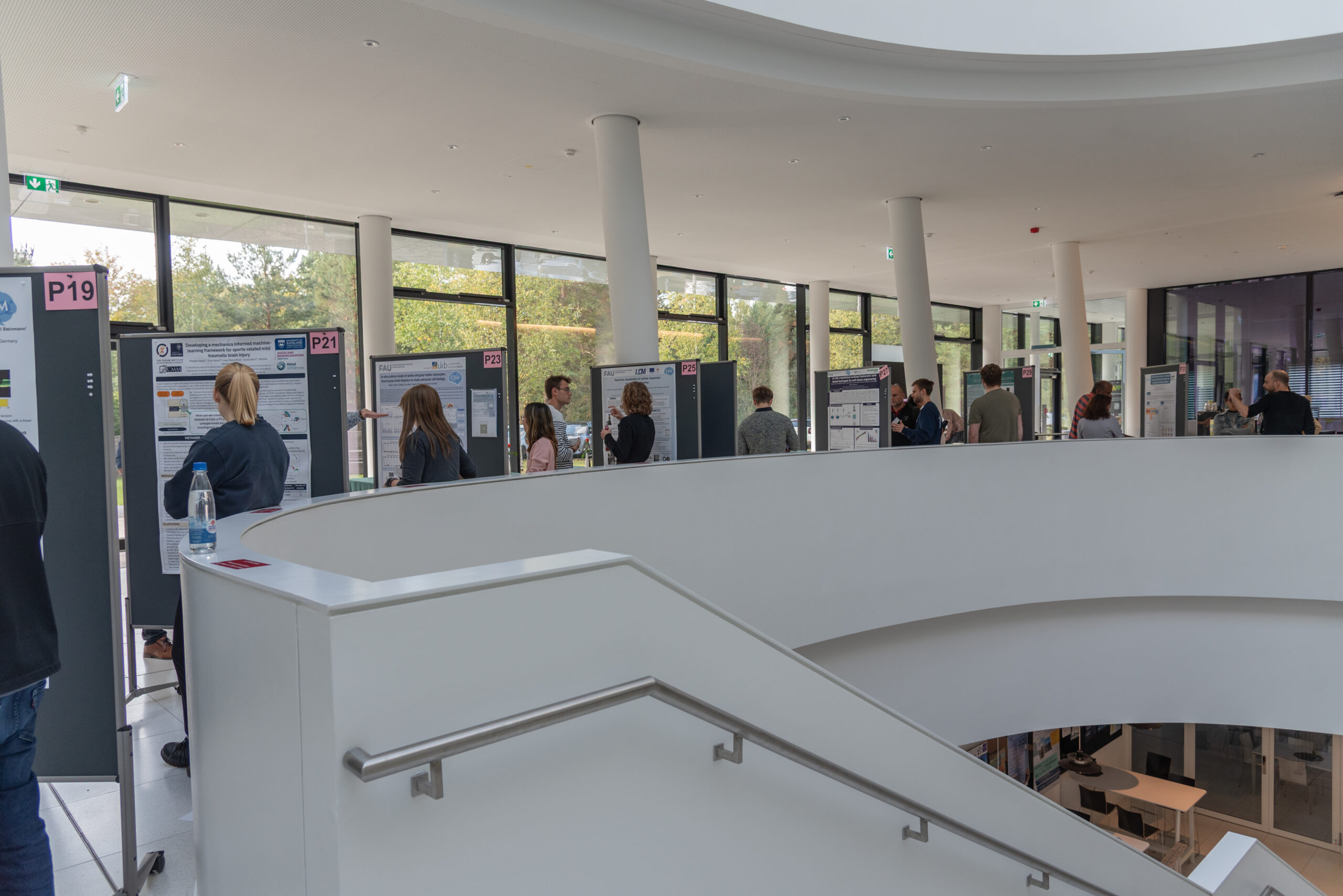 Engaging discussions during the poster session at the EBM Symposium 2025 (Image: S. Viezens)