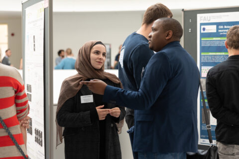 Engaging discussions during the poster session at the EBM Symposium 2025. (Image: S. Viezens)