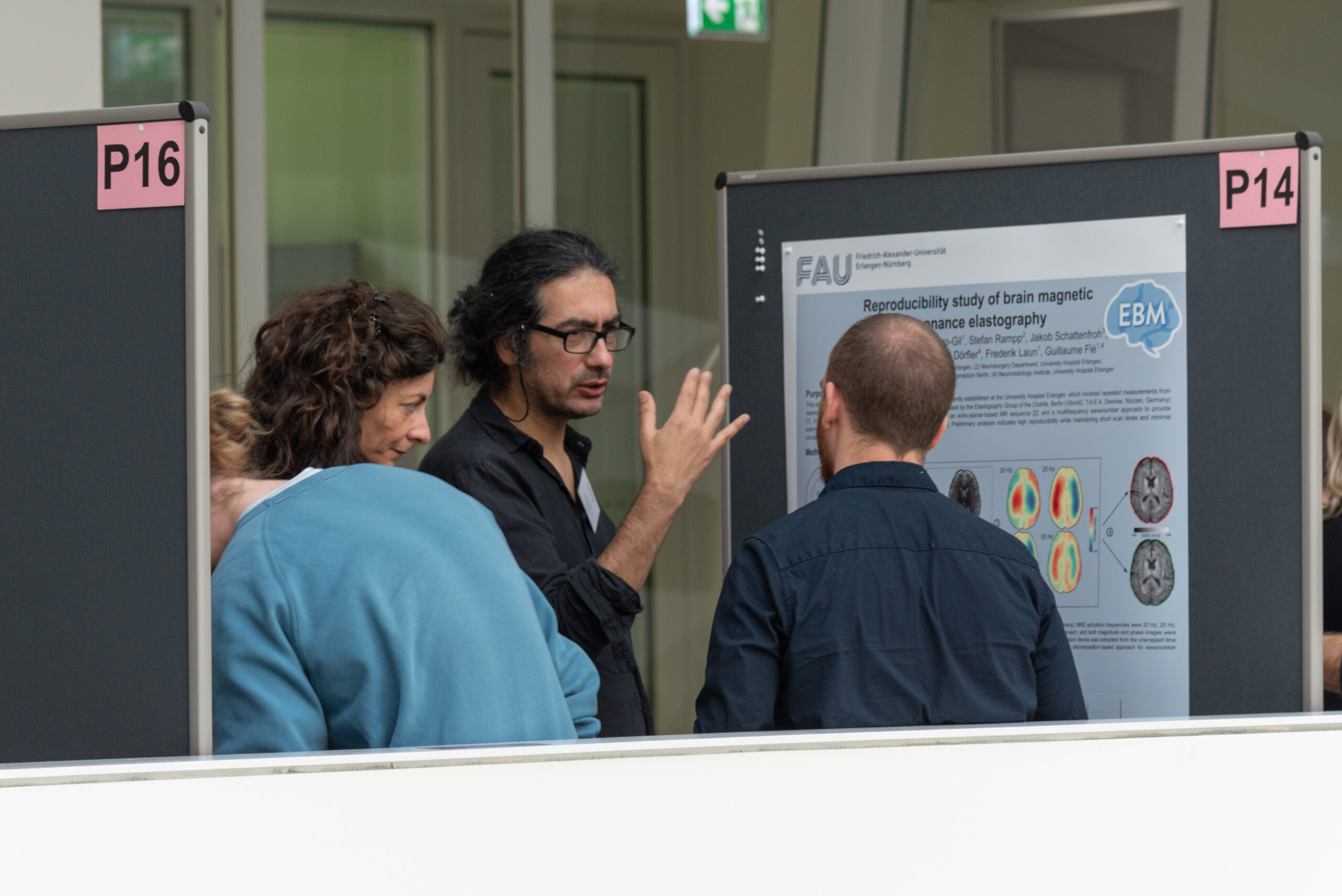 Engaging discussions during the poster session at the EBM Symposium 2025 (Image: S. Viezens)