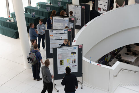 Engaging discussions during the poster session at the EBM Symposium 2025. (Image: S. Viezens)
