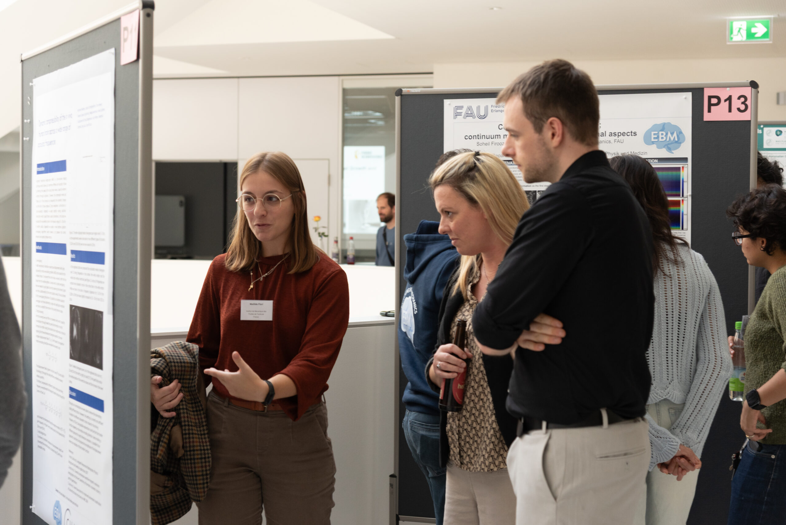 Engaging discussions during the poster session at the EBM Symposium 2025 (Image: S. Viezens)