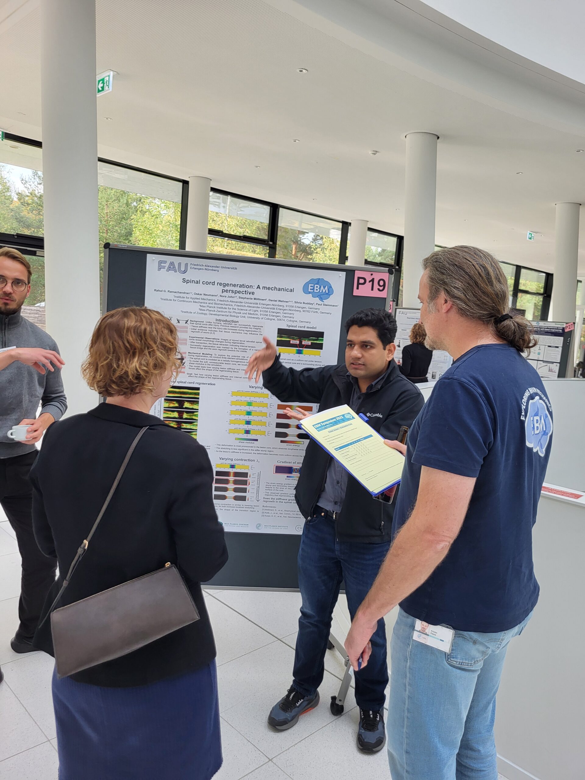 Engaging discussions during the poster session at the EBM Symposium 2025 (Image: A. Dakkouri-Baldauf)