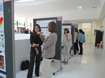 Engaging discussions during the poster session at the EBM Symposium 2025. (Image: D. Bittner)