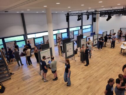 Bird's-eye view of the poster session during rehearsal — science in full swing, even before showtime. Photo: A. Dakkouri-Baldauf