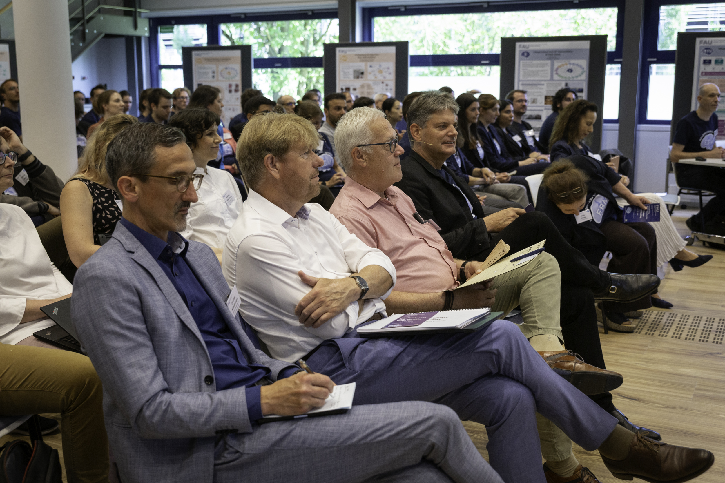 FAU representatives taking notes, fully engaged with the presentations. Photo: M. Gräve, J. Gonzalez / MMZ (FAU)